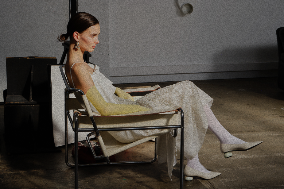 Watercolor landscape painting showing a serene beach scene