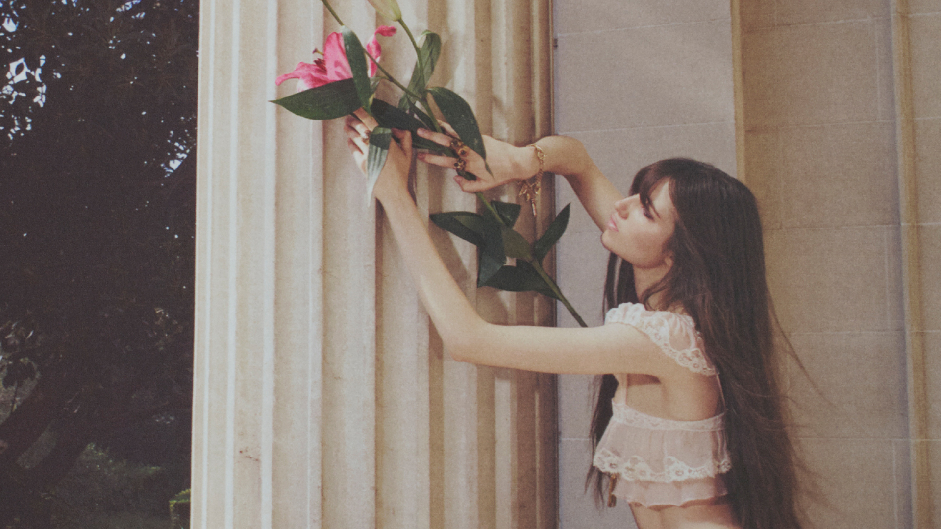 Watercolor landscape painting showing a serene beach scene